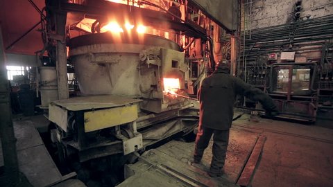 Worker On Steel Plant Operates Molten Stock Footage Video (100% Royalty-free)  15542455