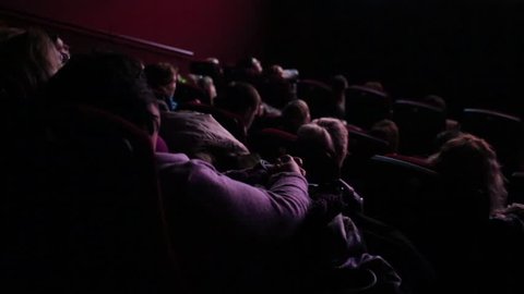 The auditorium filled with spectators in the cinema