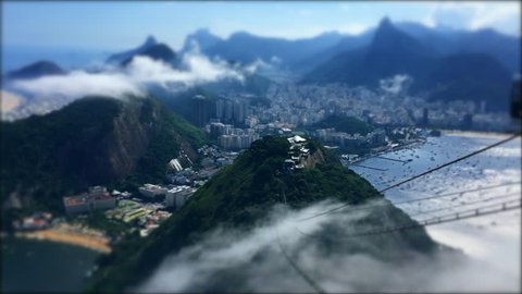 Mist swirls across the jungle karst mountains of the Rio de Janeiro Brazil skyline