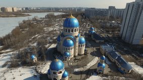Aerial videos of the Orthodox Church from the height of bird's flight with the blue domes in Moscow