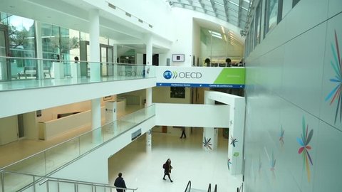 PARIS - MARS 9, 2016: Dolly shot of OECD (Organisation for Economic Co-operation and Development) interior. The OECD is founded in 1961 to stimulate economic progress and world trade.