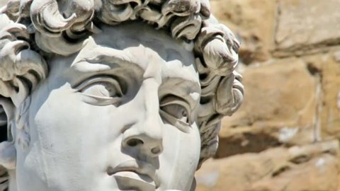 Detail close-up of Michelangelo's David statue  with place for your design or text and the left video camera motion