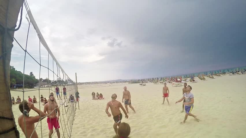 DURRES, ALBANIA - circa AUGUST, 2015: playing beach volleyball. - Slow Motion