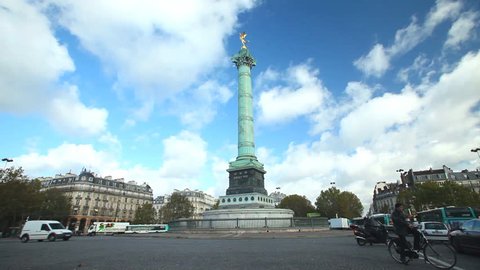 PARIS - OCTOBER 2012: Timelapse of traffic and clouds at Bastille monument on October 12, 2012 in Paris, France. Historically, the Bastille is the central gathering point for political demonstrations.