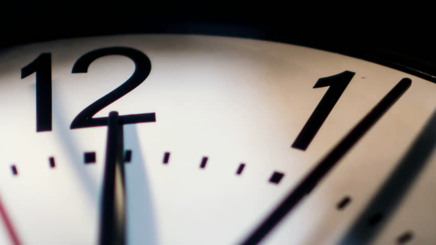 Time passing on classic wall clock face closeup  Royalty-Free Stock Footage #15588139