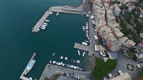 Aerial Video of the Pier With Yachts and Small Town With Small Colored Houses, Summer Day. Portovenere in Italy
