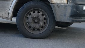car wheel goes on the road