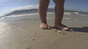 Baby / toddler / small child walking on the beach / sea. Feet close up. HD
For videos about: swimming, pools, summer fun, vacation, getaways, underwater footage, kids, beating the heat, and exercise.