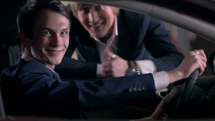 Guys in the car posing to camera | Shutterstock HD Video #15606319
