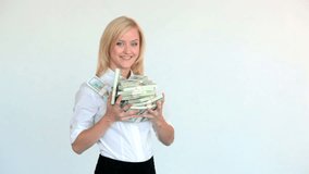 Pretty blonde showing dollar bills in her hands