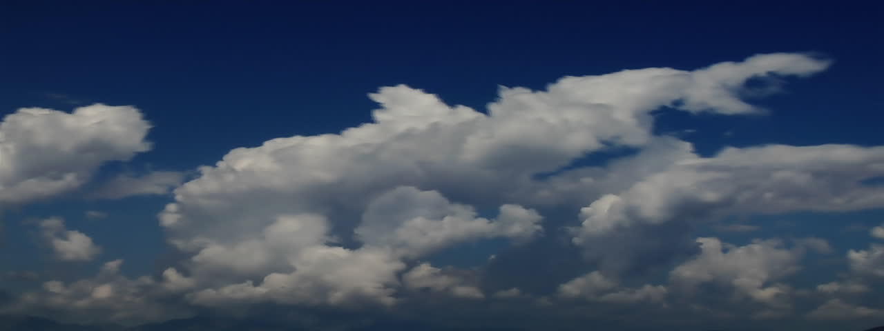 A beautiful time-lapse of clouds in a blue sky. 