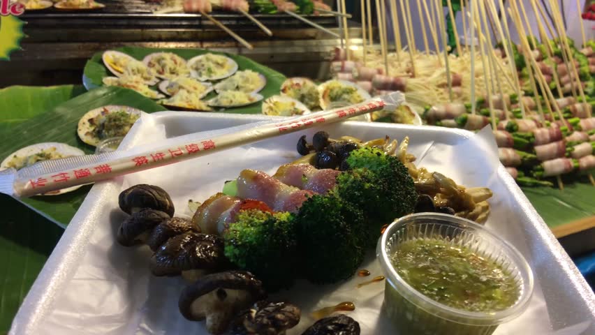 A plate of healthy barbecue food at a market in Bangkok, Thailand