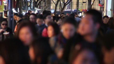 Seoul_30 March 2016 : Crowd of people walking and shopping on Myeongdong street in Seoul, South Korea 