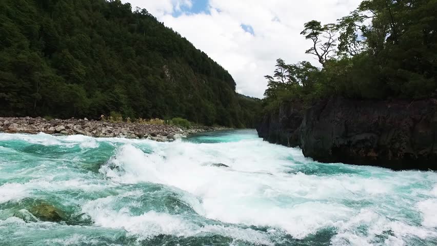 Raging River Rapids Near Volcano Osorno, Near Puerto Varas Chili.  Northern Patagonia Region | Shutterstock HD Video #15627199