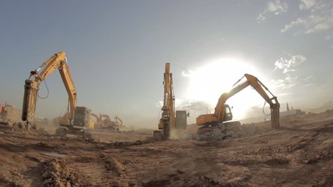 Madina - Saudi Arabia 8 December 2014- Hydraulic hammer breaker on excavator destroying rocks - Fish Eye