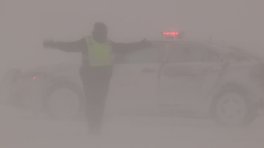 Ontario, Canada February 2015 Extreme weather blizzard and snowstorm traps drivers and police Royalty-Free Stock Footage #15633007