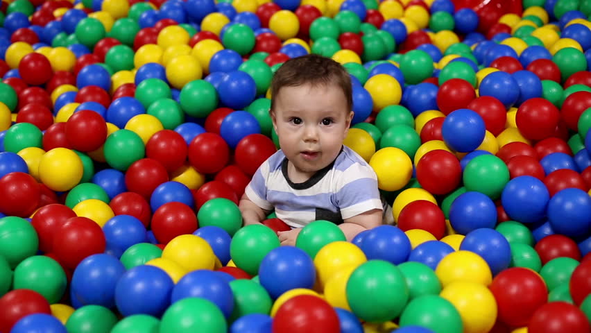 baby in ball pit