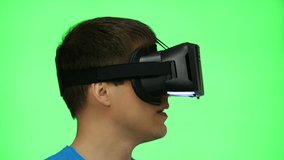 Chromakey footage of a Man in Virtual Reality Glasses. 4K UHD video.