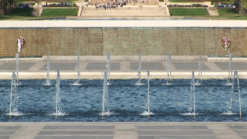 The camera pans from the fountains up to the Lincoln Monument in Washington, DC