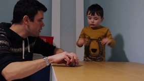 Little Boy With His Dad Learning How To Do It Yourself