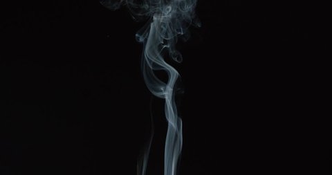 Magical wisps of smoke rise from bottom of frame as if from candle or fire against black background, ALPHA MATTE