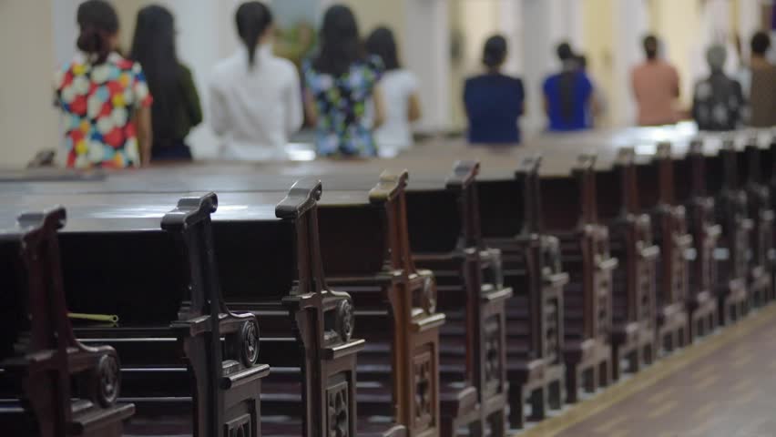 View from behind of people sitting in church in Vung Tau, VIetnam Royalty-Free Stock Footage #15677971