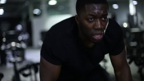 Hard Working Young Athlete Trains on Spinning Exercise Bike - Powered by Shutterstock - Get 15% off with code: PIKWIZARD15