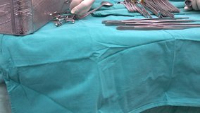 scrub nurse prepare medical equipment before open heart surgery | 4k video