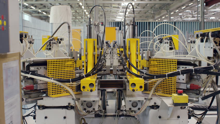 Machine in a production line assembling products VD Le Marais, Switzerland October, 2015