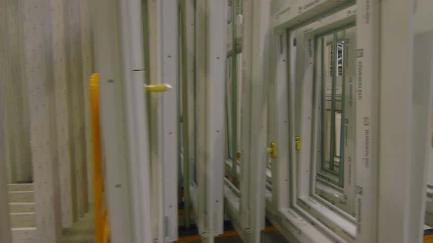 Steady cam walking through a storage warehouse in a factory. VD Le Marais, Switzerland October, 2015