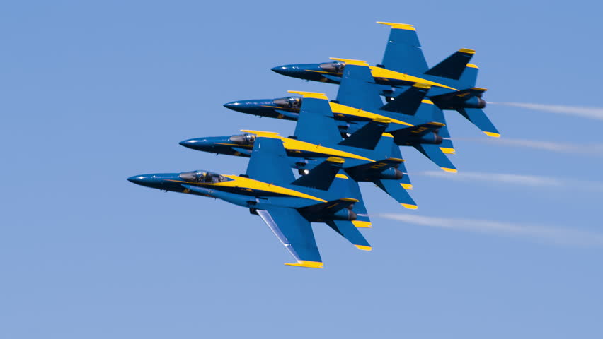 NORTH KINGSTOWN, RHODE ISLAND - CIRCA JUNE 2014:  Navy Blue Angels demonstration team in F18 Hornet fighter jets performing during air show. Beautiful shot of four jets flying close to each other. 4K.