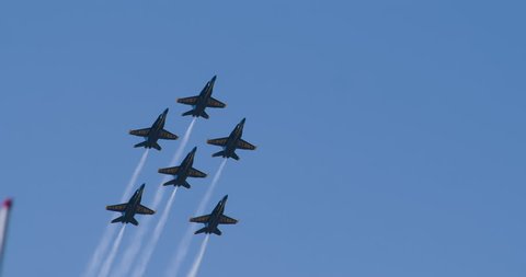 NORTH KINGSTOWN, RHODE ISLAND - CIRCA JUNE 2014:  Navy Blue Angels demonstration team in F18 Hornet fighter jets performing during air show. 4K.