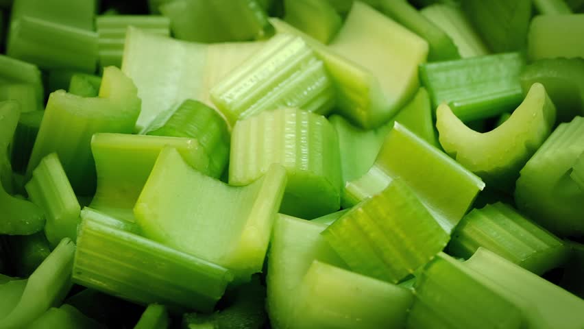 Celery Pieces Rotating Closeup | Shutterstock HD Video #15696976