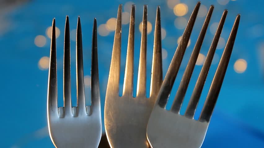 fork, spoon and knife in closeup