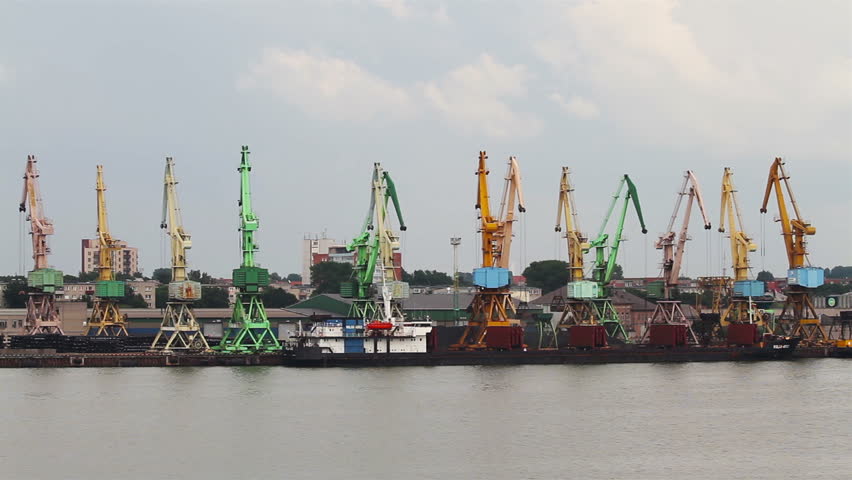 working cranes at port
