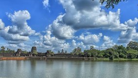 Timelapse of the main temple in Angkor Wat, Cambodia during the day. Fast motion video clouds rolling in the background.