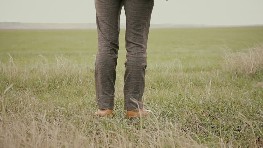A man with an ax in the field