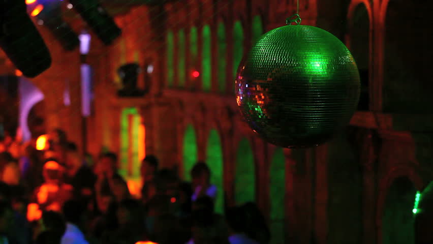 Disco ball on the nightclub background