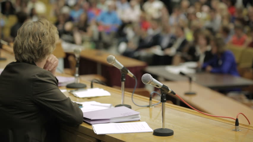 A state senator listens to testimony at the Massachusetts State House  Royalty-Free Stock Footage #15721012