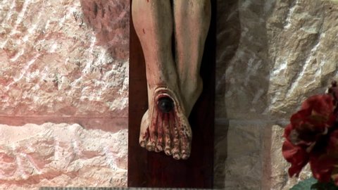 statue of the crucified Jesus in the grotto of Gethsemane