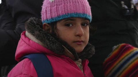 6th, December, 2015: a refugee girl awaiting further out in Idomeni
