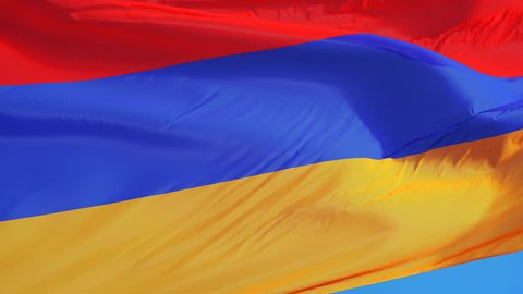 Armenia flag waving in slow motion against blue sky, seamlessly looped, close up, isolated on alpha channel with black and white luminance matte, perfect for film, news, digital composition