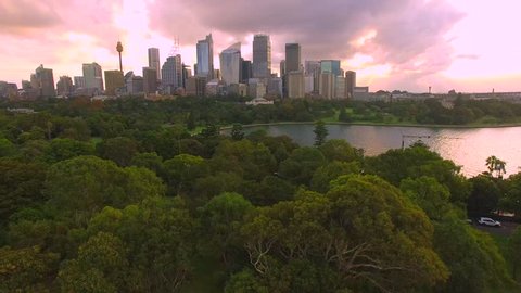 Aerial flight over Sydney Australia skyline in 4 K during sunset