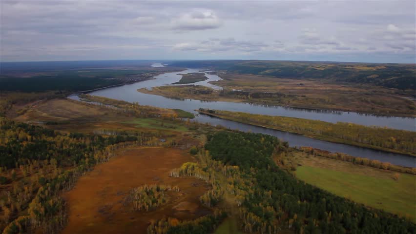 the taiga river and the leaden sky