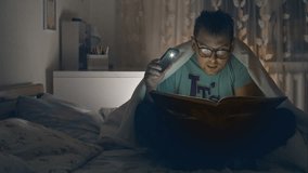 Adult man funny glasses reading book. Young guy reading book at home. RAW video record.