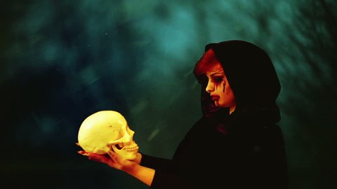 Bizarre witch, creepy skull concept