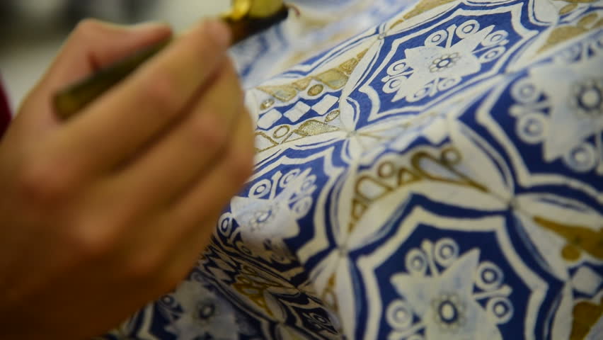 Detail of waxing the drawing to textile for making batik Royalty-Free Stock Footage #15784513