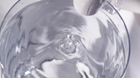 drop of water in a glass slow motion