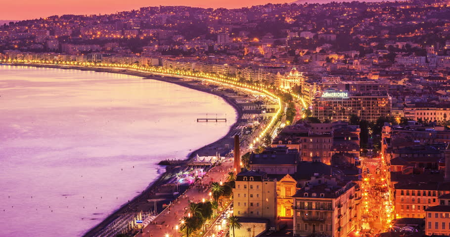 Timelapse of Nice panorama, cityscape at sunset with traffic street and building rooftop/Night Aerial Skyline Nice Luxury Travel Tourism French Riviera France European
