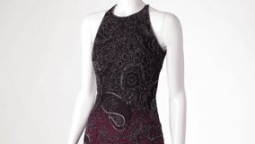 Mannequin in backless dress turning. Floral pattern evening dress. Woman's luxury evening garment. Festive dress on white background. - Powered by Shutterstock - Get 15% off with code: PIKWIZARD15